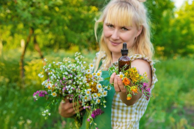 a-woman-makes-herbal-tincture-selective-focus-2024-12-19-12-44-20-utc