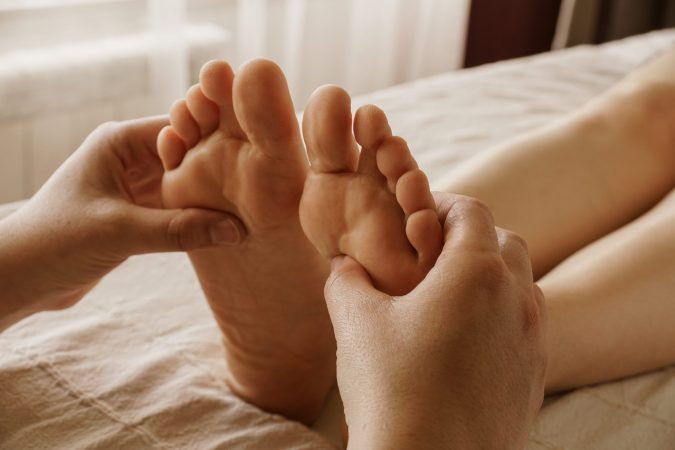 closeup-shot-of-masseur-massaging-a-female-s-feet-2025-02-03-07-49-51-utc