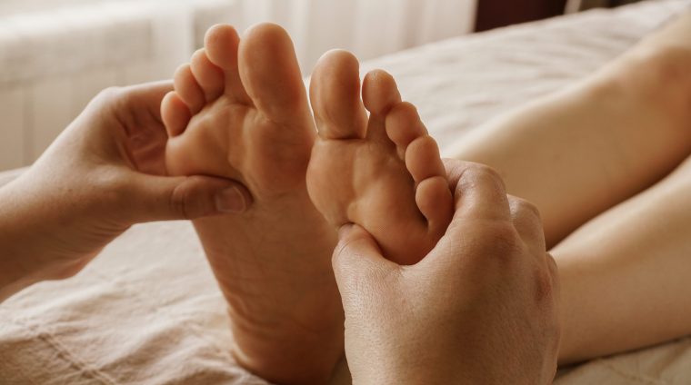 closeup-shot-of-masseur-massaging-a-female-s-feet-2025-02-03-07-49-51-utc