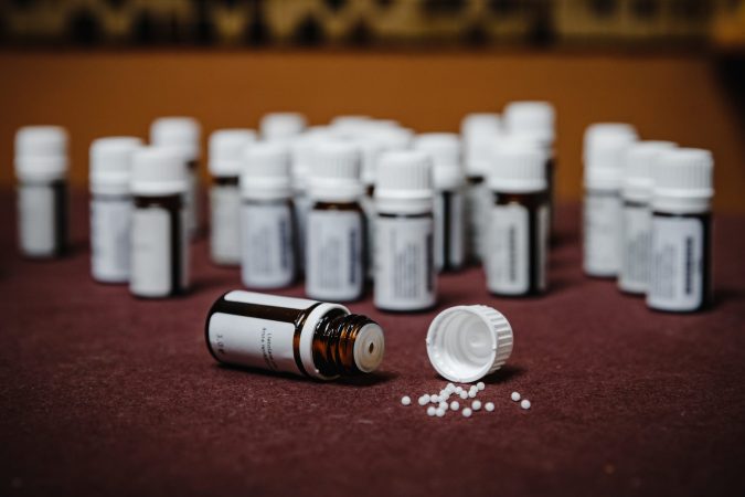 closeup-shot-of-small-glass-bottles-of-pills-on-th-2025-02-11-23-51-52-utc
