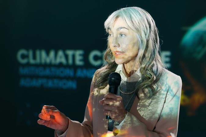 conference-mature-woman-and-seminar-on-stage-for-2024-07-11-23-14-52-utc