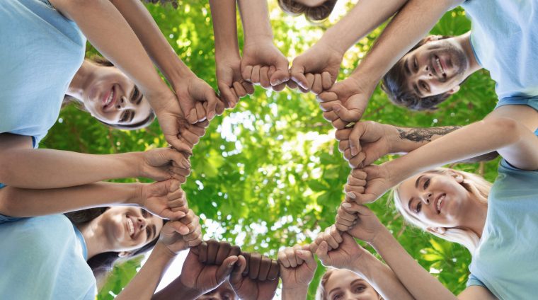 group-of-people-fist-bump-assemble-together-2025-03-18-17-41-08-utc