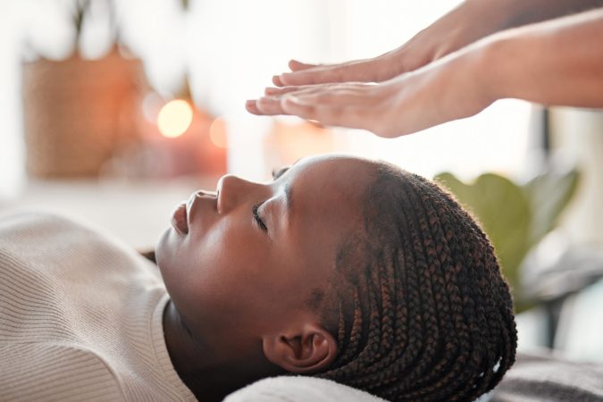 relax-reiki-and-black-woman-with-lying-at-spa-for-2023-11-27-05-25-05-utc