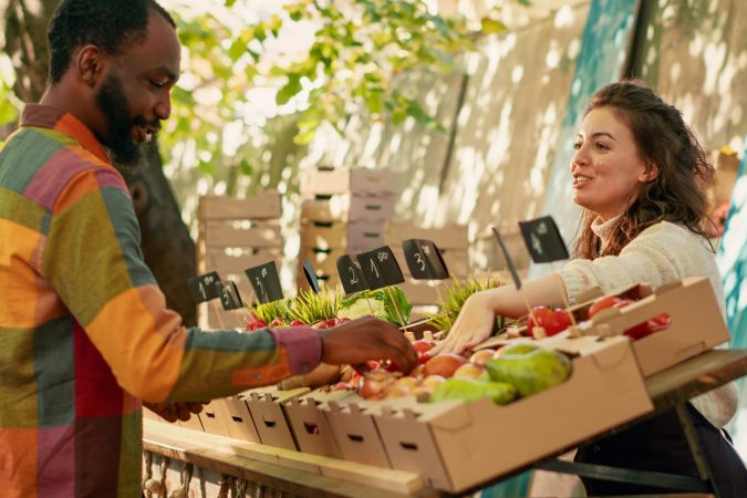 team-of-vendors-selling-locally-grown-eco-produce-2025-02-19-21-22-33-utc